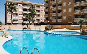 Apartamento con terraza, piscina y playa a 400m